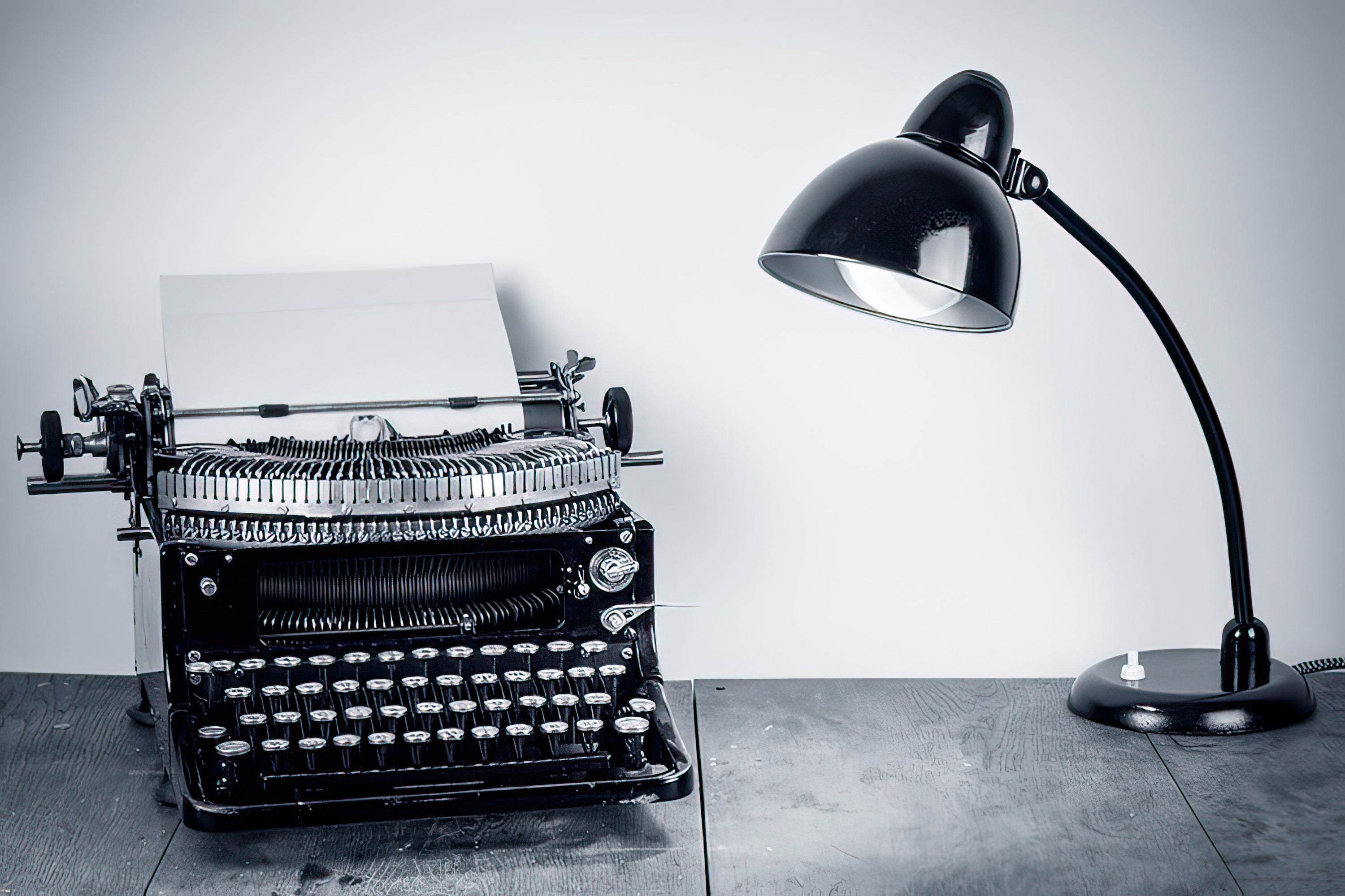 Prewriting Your Screenplay: A Step-by-Step Guide to Generating Stories - Book Review - Image of Typewriter and Desk Lamp