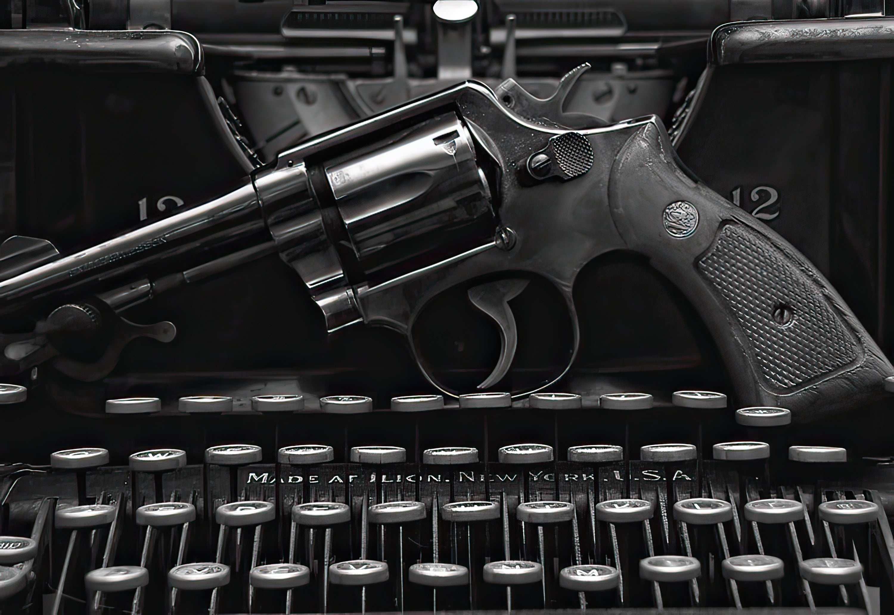 The Life of Crime: Detecting the History of Mysteries and their Creators - Book Review - Image of Gun Resting on Typewriter
